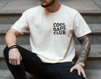 man in a cool dads club tshirt